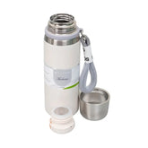 White insulated bottle with detachable cup and lid on a white background