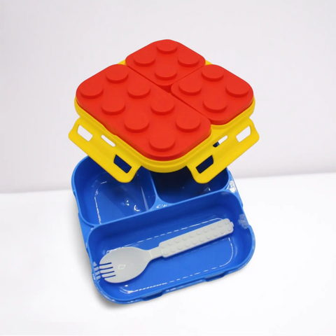 Colorful children's plate set with red and yellow block design on a white background