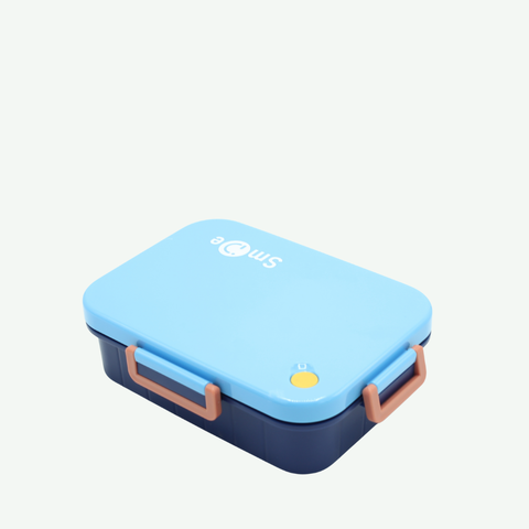 Blue and navy Lunch box with a handle on a light gray background