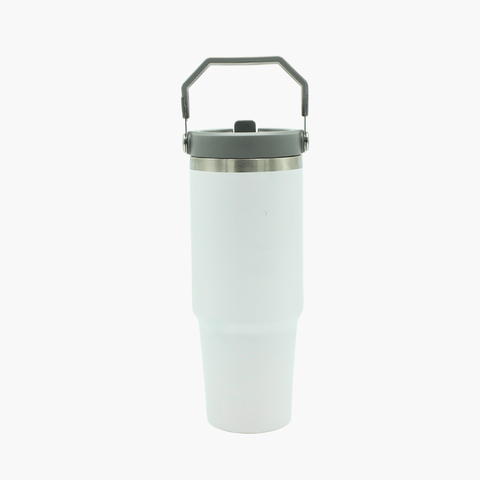 White insulated tumbler with a black lid and handle on a white background